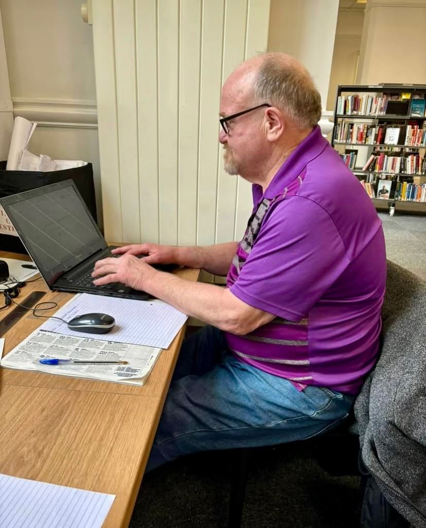 Library user on computer Library user on computer