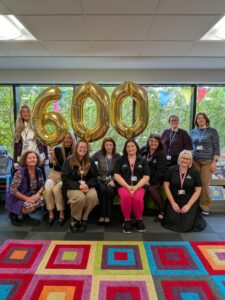 Library staff celebrating 600 reading stars